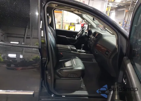 2015 Nissan Armada Platinum z USA, uszkodzony, nr VIN 5N1AA0NEXFN612770